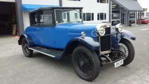 Motor trimming shown with custom Sunbeam convertible soft top