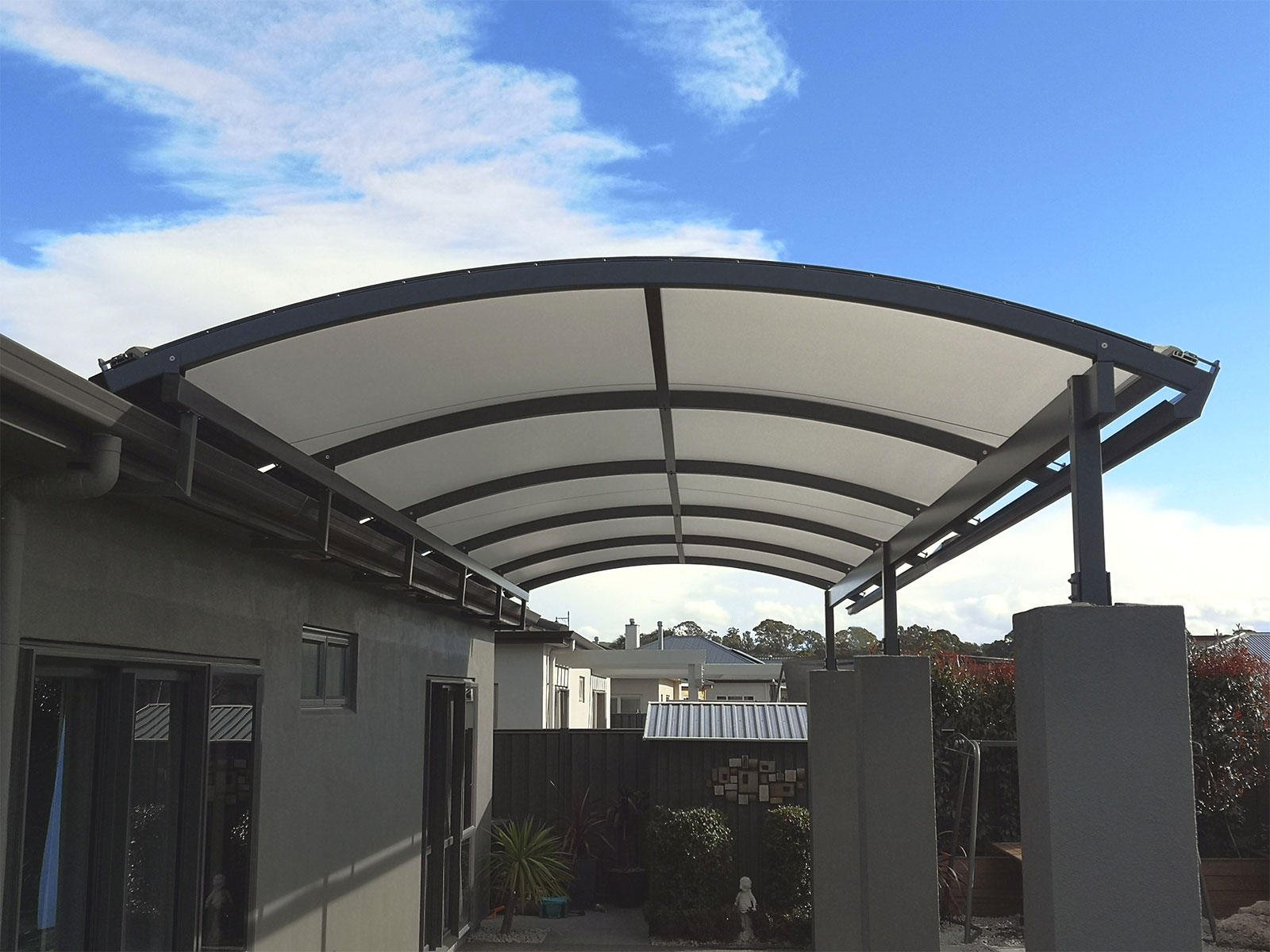 Alitex curved canopy provides an all aluminium pergola with roof – a fantastic option for modernising a space.