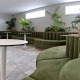 Closeup of bolsters made out of green fabric plus custom curved squab seating