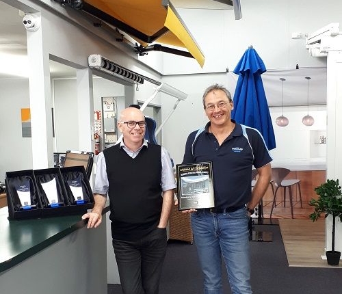Stephen Sinnott and Freddy van der Schyff at Douglas looking happy with the international awning award