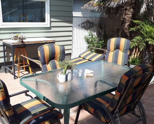 Outdoor chair upholstery table setting Napier Hastings NZ