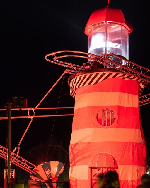 The Walk of Wonders Lighthouse on display at night