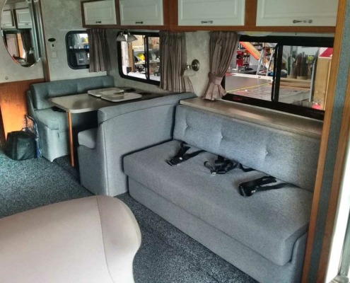 Motorhome interior reupholster Hawke's Bay with couches carpet and custom bed