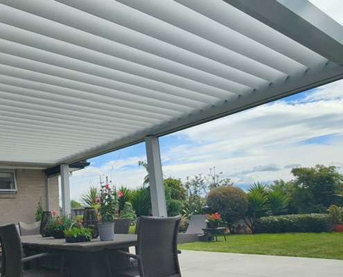NZ Louvres Roof installed by Douglas Innovation provides shade and shelter for outdoor living space