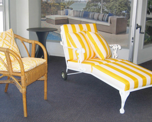 Outdoor lounger and cushions recovered to enhance outdoor entertainment area