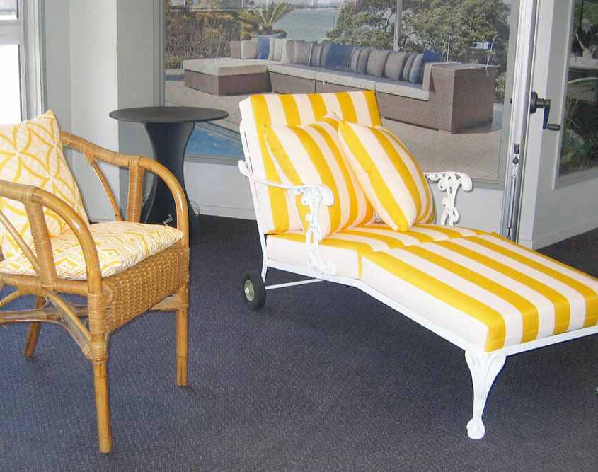 Outdoor lounger and cushions recovered to enhance outdoor entertainment area