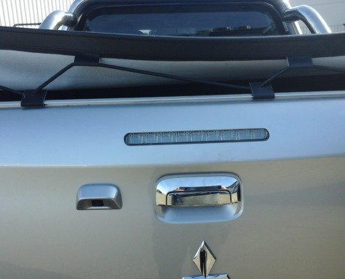 Detail showing how we achieved the smooth edge finish of the slick-fit tonneau cover
