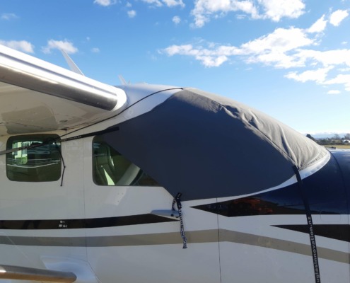 Custom made airplane cover keeps the craft flight-ready