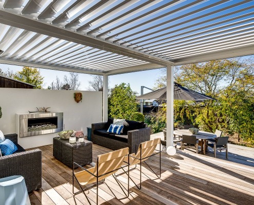 Louvre roof on fireside deck installed by Douglas Outdoor Living Solutions